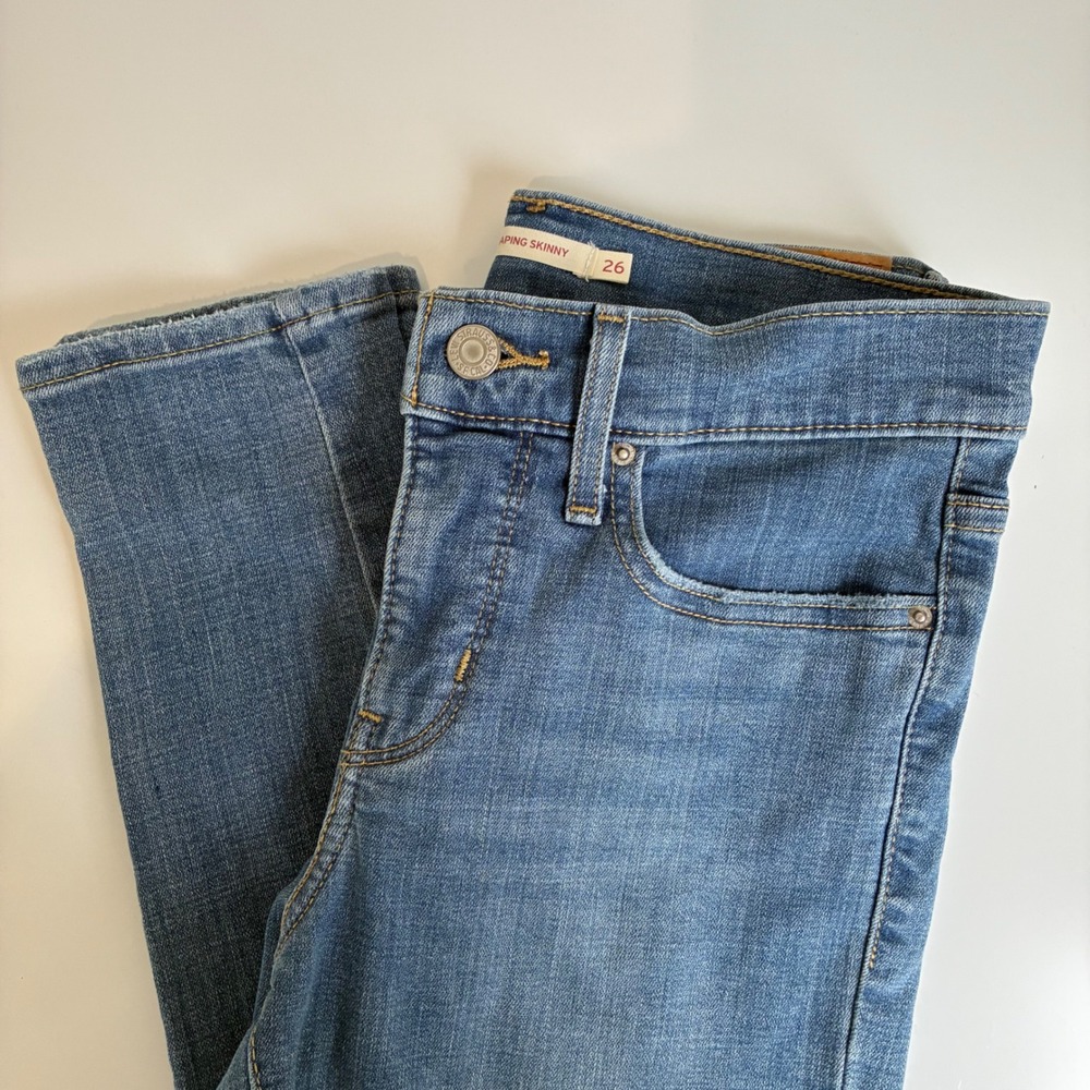 Levis 311 Shaping Skinny Jeans Womens 26 Medium Wash Denim Blue Stretch 9in Rise